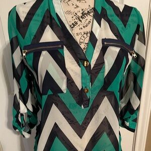 Women’s polyester blouse size small. Lightly used